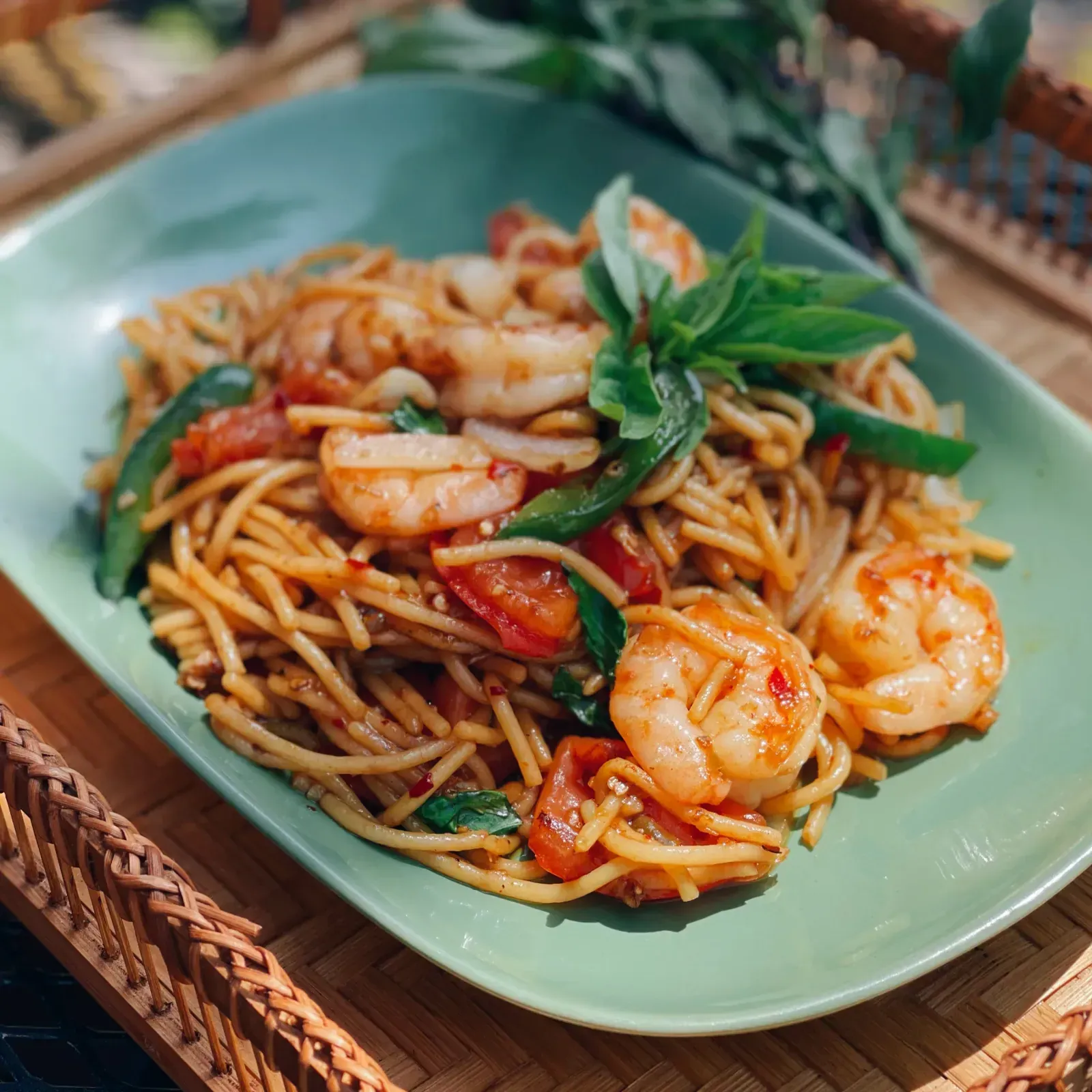 Drunken-style Italian spaghetti stir-fried with chili, Thai basil and fresh vegetables