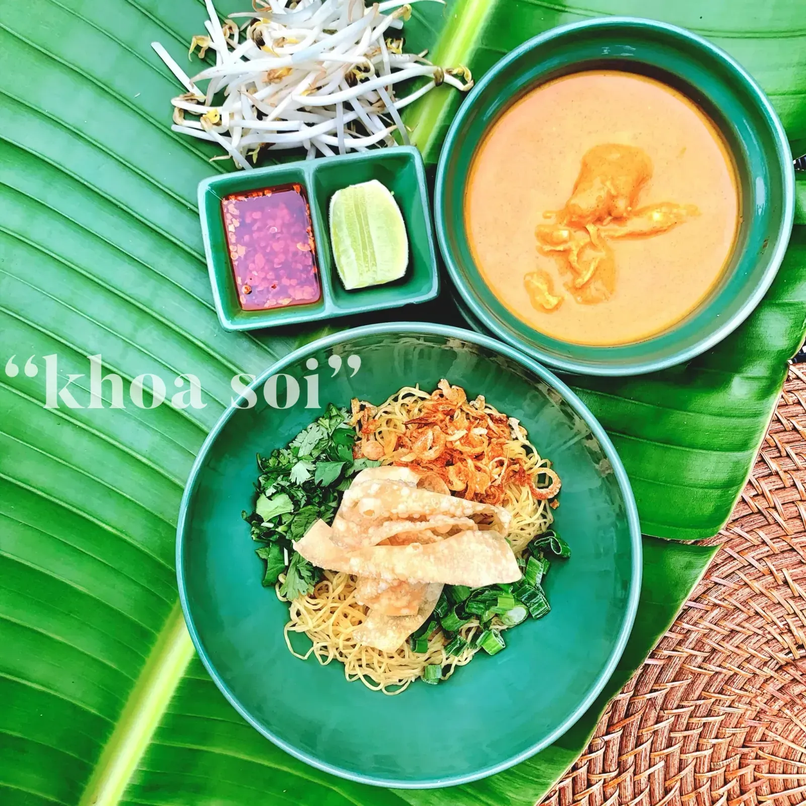 Khao Soi coconut curry egg noodles topped with crispy noodles, shallots and lime