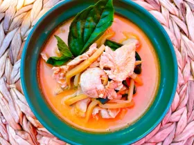 Thai red curry Gang Pedd with bamboo shoots, coconut milk and basil leaves