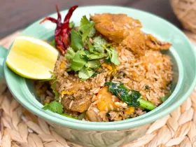Salid fish fried rice with crispy fish, Chinese broccoli, egg and dried chili