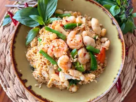 Spicy seafood fried rice with mixed seafood, basil leaves, spices and chili peppers