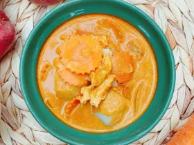 Thai yellow curry Gang Karee with potatoes, onion and carrots in coconut milk